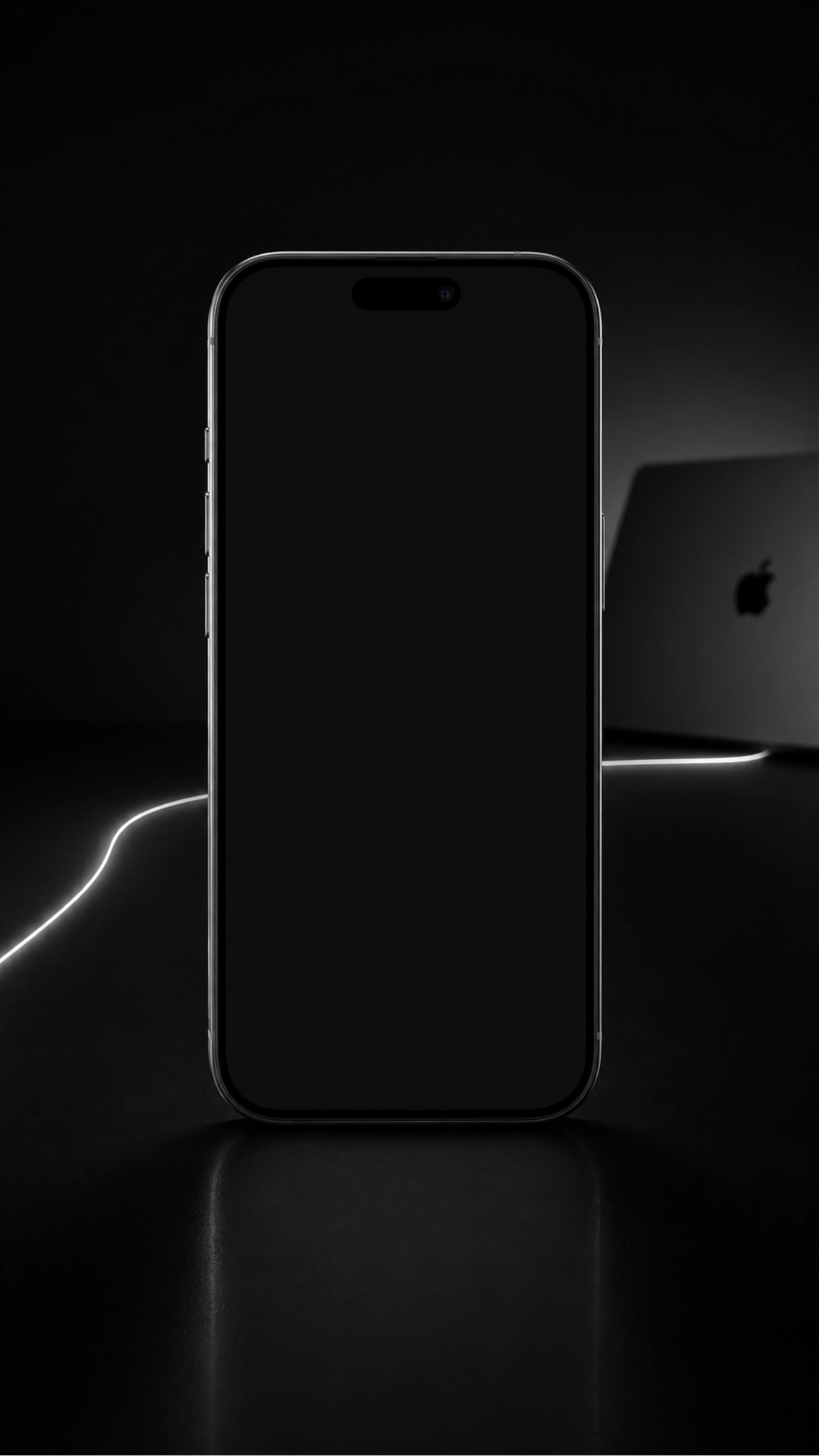A dark iPhone connected to a MacBook by a restrained silver light line